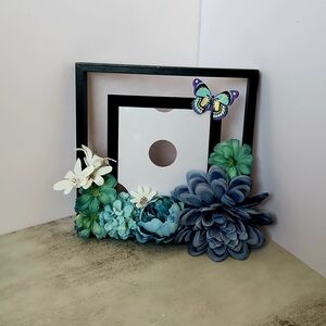 Elegant Floral Frame with Butterfly Accents